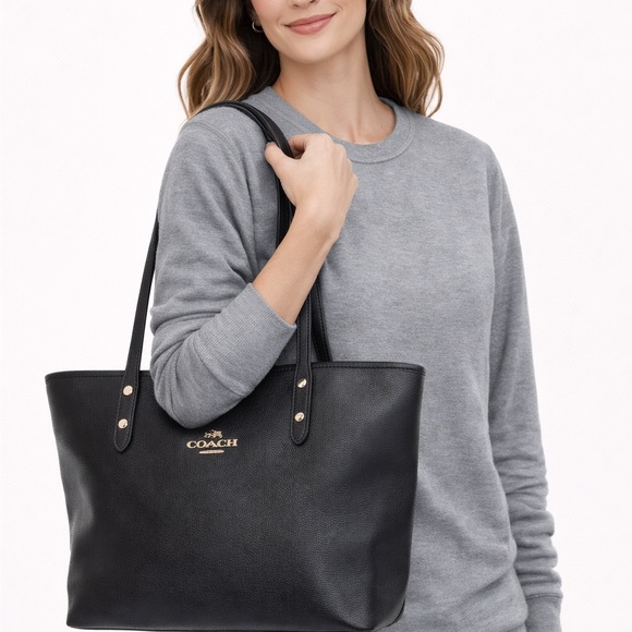 Coach Handbags - Coach Black Tote with Gold Accents